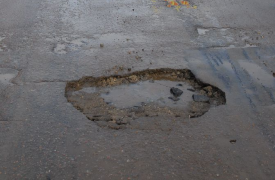 Две местных администрации в Тульской области оштрафовали за ямы на дороге