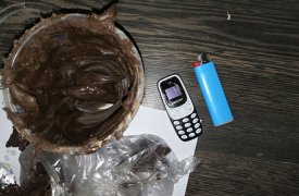 В тульскую колонию пытались передать мобильник в банке с шоколадной пастой