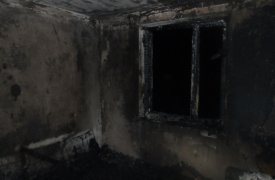 При пожаре в квартире в Суворовском районе пострадал человек